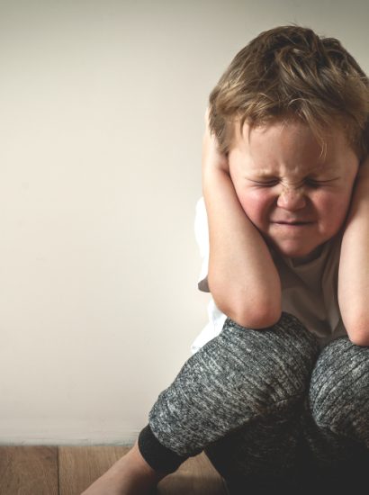 Child Covering Ears With Hands Not Autism
